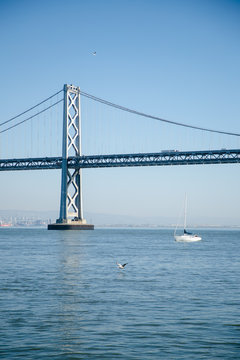 Golden Gate Bridge on a bright summer day in San Francisco. The photo was taken aerially from a drone.  