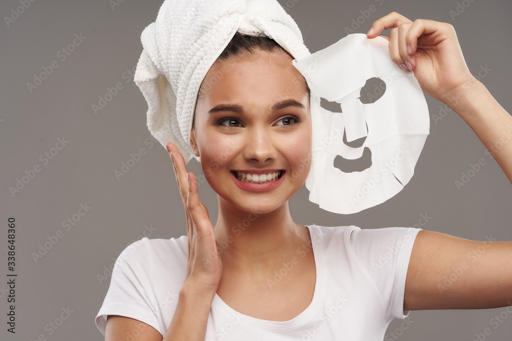 Wall mural young woman with towel