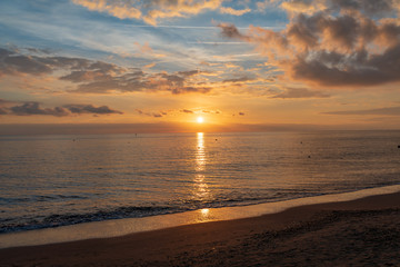 Colourful sunset in Ostia beach during winter (Rome, Italy).