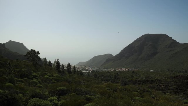 Tamaimo village in the valley surrounded by mountains in Tenerife