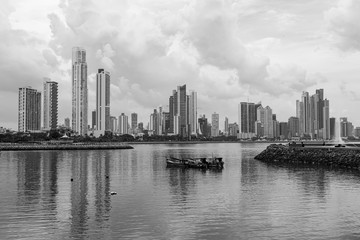 View of the fishing port with the modern town and its skyscrapers on the background (Panama City).