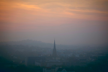Fototapeta na wymiar City at foggy morning