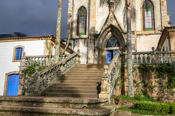 View to entrance stairway of church in sunlight, Sanctuary Caraca, Minas Gerais, Brazil
