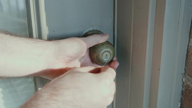 picking a lock on a door