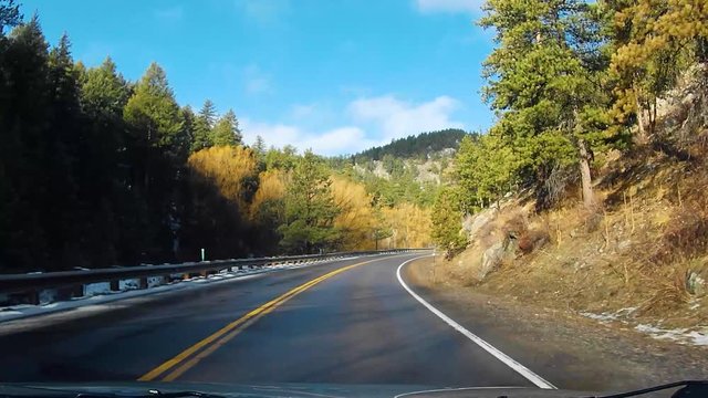 Hyperlapse of Driving On a Forested Mountain Road in the Morning on a Sunny Spring Day
