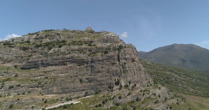 Beautiful view of Archeological Monument Church at the edge of a cliff in Nemea, Greece