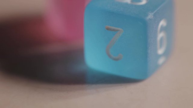 Colorful numbered dice for a fun board game - close up