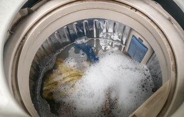 top view of wash dirty clothes in washing machine