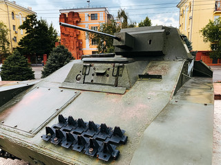 tank caterpillar in city, iron wheels, tank undercarriage close up, metal wheels concept war combat...