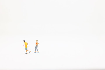 Fototapeta na wymiar a Close up of man runner miniature figure people running