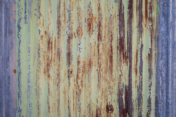 old rusty galvanized, corrugated iron siding vintage texture background