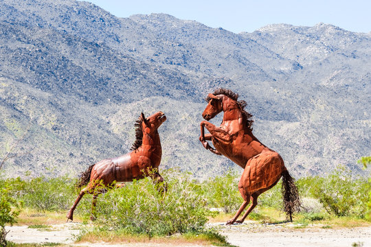 Mar 18, 2019 Borrego Springs / CA / USA - Outdometal sculptures of fighting wild horses, close to Anza-Borrego Desert State Park, part of Galleta Meadows LLC, an unfenced and open to the public area