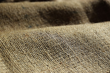 Brown hessian sacking material background texture