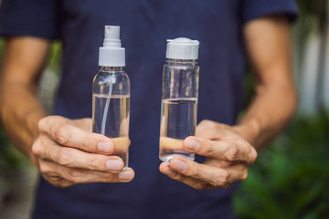 Men's hands using wash hand sanitizer gel