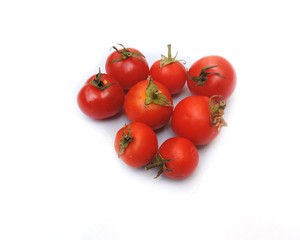 Cherry tomatoes on white background. 