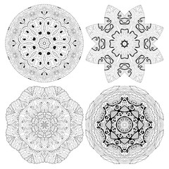 Hand drawn zentangle set of 4 mandalas for coloring page.