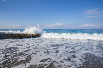 Waves on the beach tide of the sea