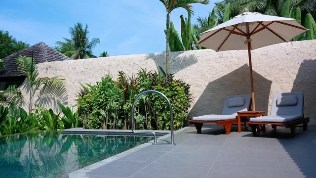 Outdoor swimming pool in hotel resort
