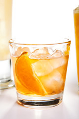 Fresh cocktail with orange and ice