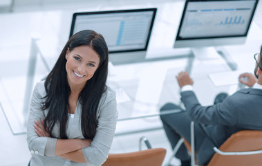 Fototapeta premium successful business woman on the background of a modern workplace