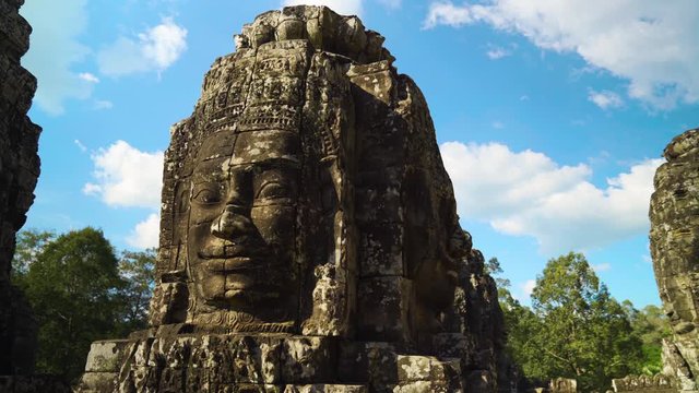 Closeup Carved Faces of Bayon Temple, Angkor, Cambodia, Tracking