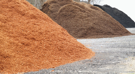  close up on colorful mulch in piles