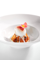 Rum baba with ice cream scoop