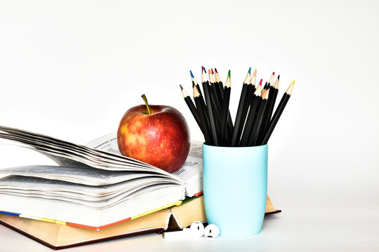 Set for the student. Back to school supplies.books and blacboard on white background. The concept of education copy spase