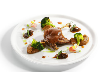 Confit duck leg with vegetables