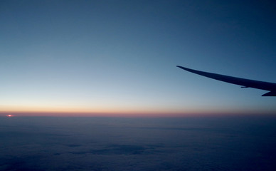 Fototapeta na wymiar view of sunset from airplane window