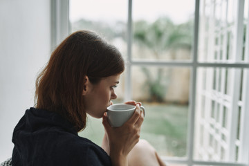 young woman drinking coffee