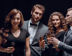 company fashionable friends ,with a glass of wine