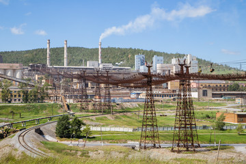 Cable car on mining site with ore carts wagons