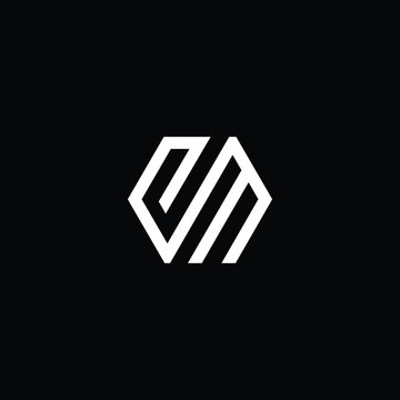 Minimal elegant monogram art logo. Outstanding professional trendy awesome artistic EM ME initial based Alphabet icon logo. Premium Business logo White color on black background