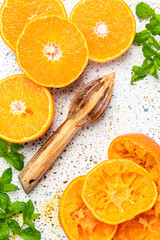 Orange Juice. Making Orange Juice with Wooden Squeezer. Top Down View. Healthy Eating Concept