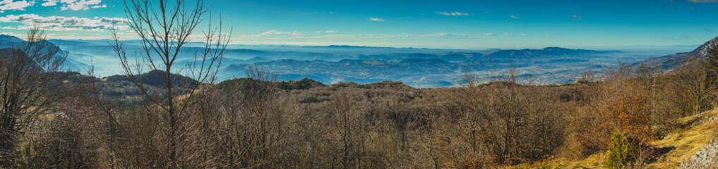 Beautiful panorama in january sun above the Vipava valley in Slovenia, looking from the top of Kovk mountain.