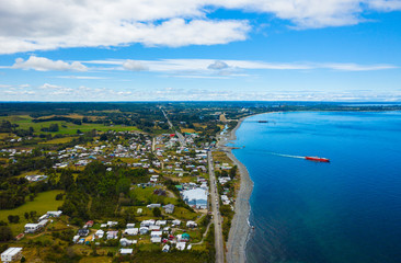 Aerial view of the town of Pargua and its coastline. place from where the ferries depart to the island of Chiloe