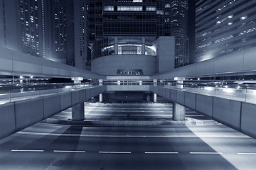 Obraz premium Exterior of modern office building in midtown of Hong Kong city at night