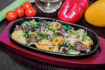 meat baked with potatoes