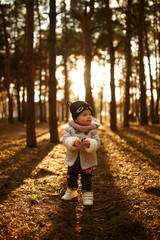 Fototapeta premium Little girls, sunset in the forest