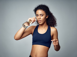 Fototapeta na wymiar young sporty woman with dumbbell