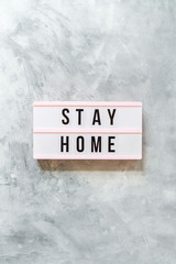 A sign saying "Stay Home"