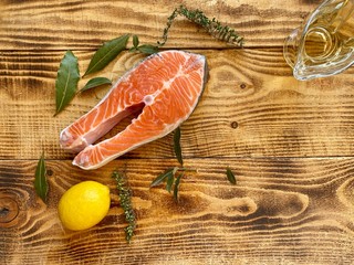 Fresh salmon pickled for a barbecue on a wooden board