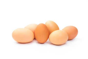 a lot of chicken eggs on a white background