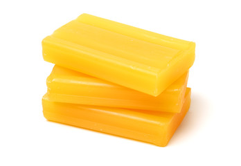 Yellow soap isolated on white background 