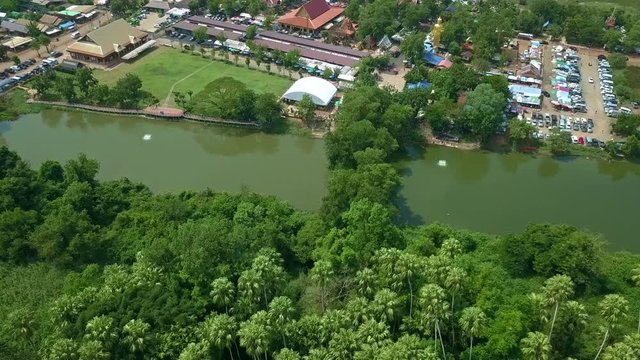 Aerial top view forest tree, Rainforest ecosystem and healthy environment concept and background, Wat Kham Chanot view from above.