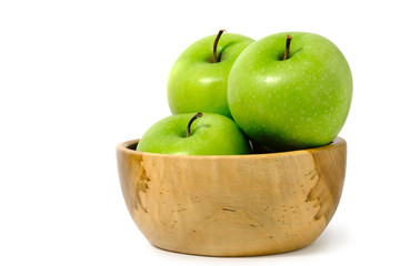 Group of green Apple granny smith above wooden bowl / basket isolated on white background