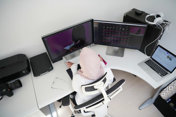 Arabic creative professional  working at home office top view