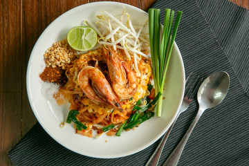Pad Thai placed on a wooden table