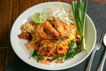Pad Thai placed on a wooden table